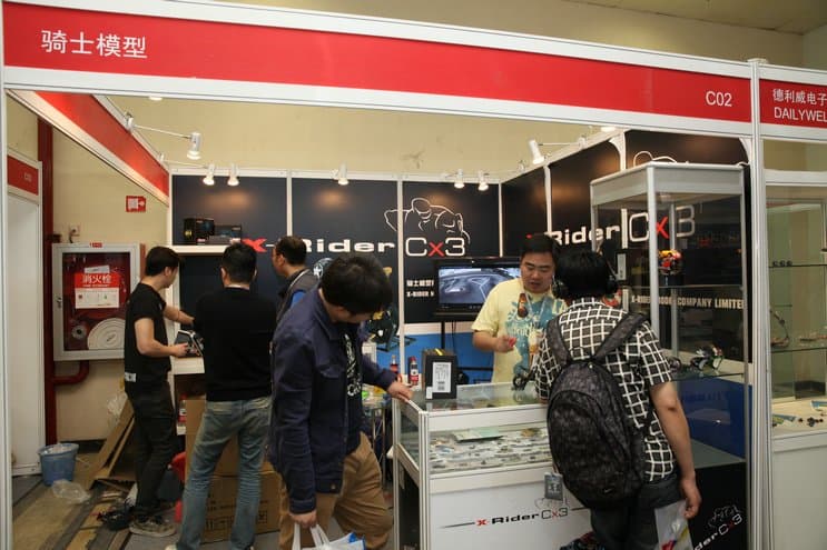 Detailed product display at XRIDER MODEL booth